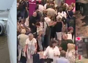 Kaos në aeroportin e Spanjës/ Shiu përmbyt pistën e avionit, pasagjerët në panik